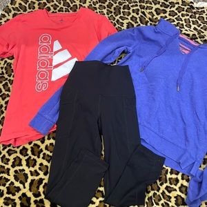 A pare of leggings a shirt and a hoodie